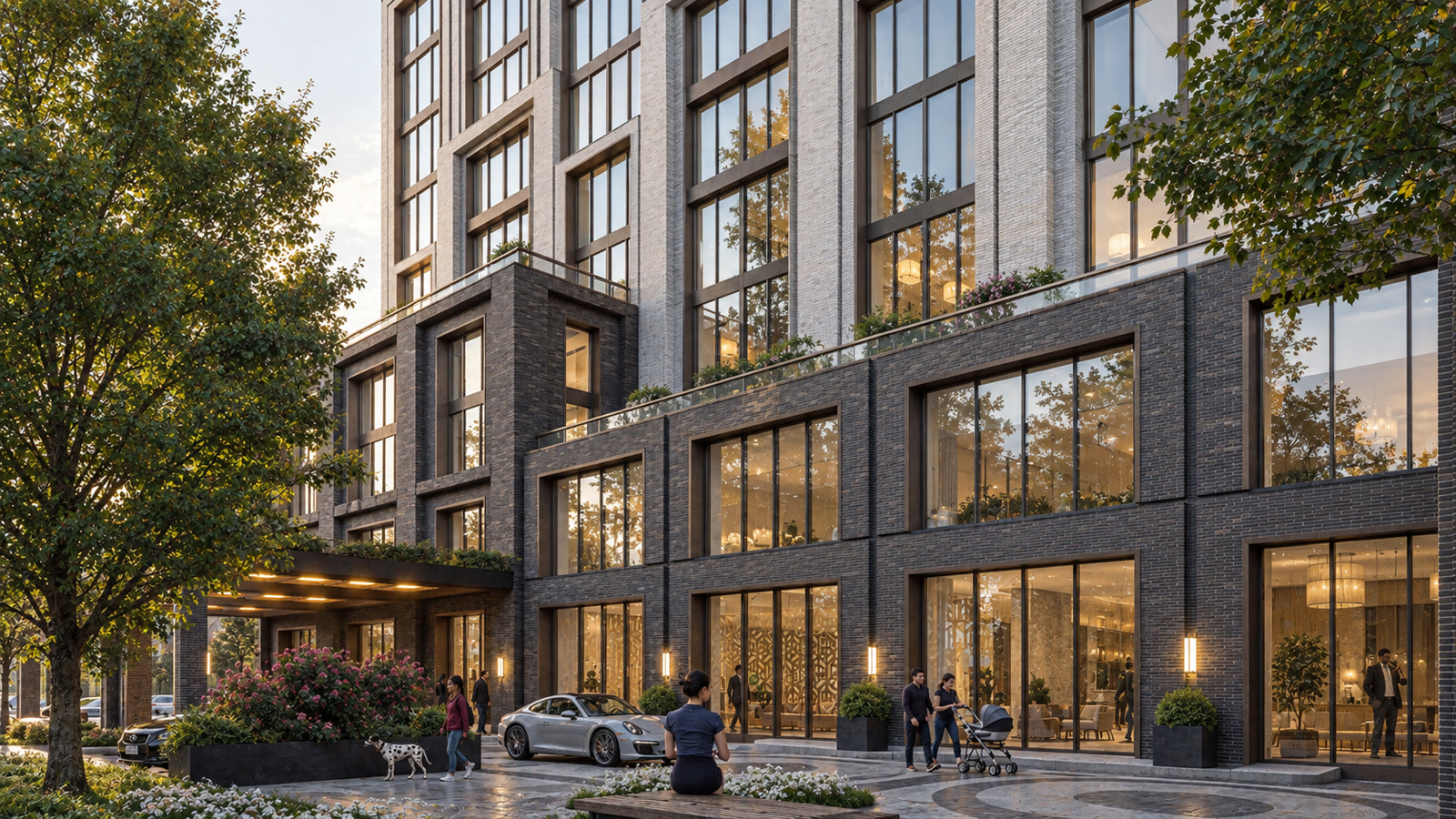 Mississauga Mid-Rise — Mississauga, Ontario · Street-level view of the landscaped entrance, dark brick podium and tall windows
