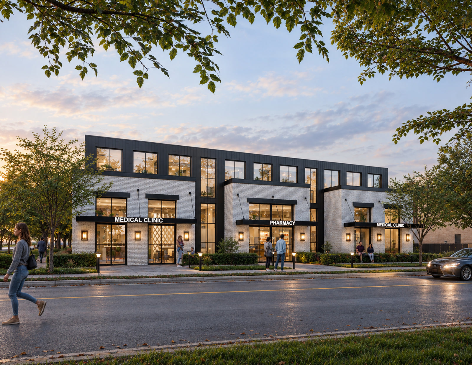 Windsor Mixed-Use Development — Windsor, Ontario · Front view of the Windsor mixed-use development with white brick storefronts and dark upper-storey cladding